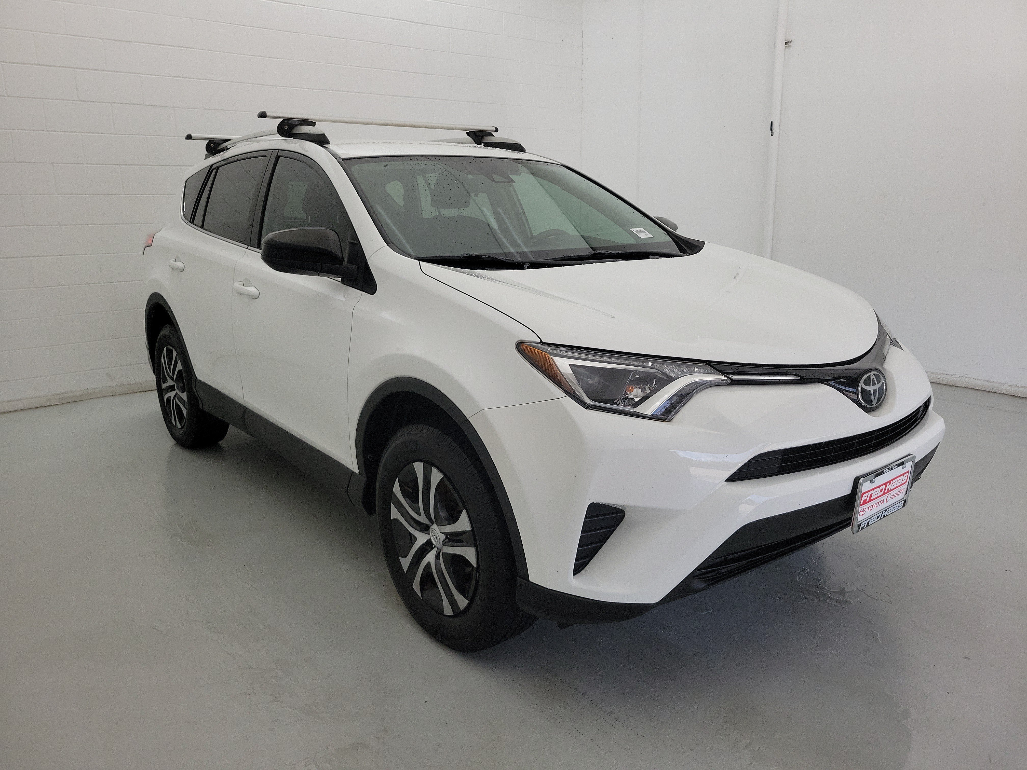 Used 2018 Super White Toyota LE image 4