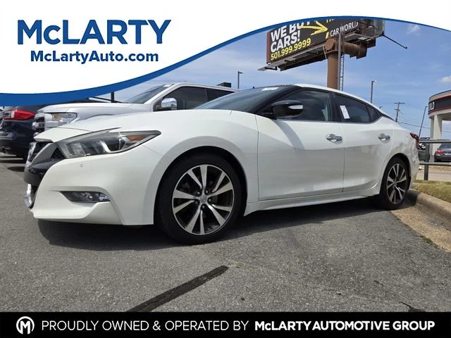 Used 2016 White Nissan Platinum image 1