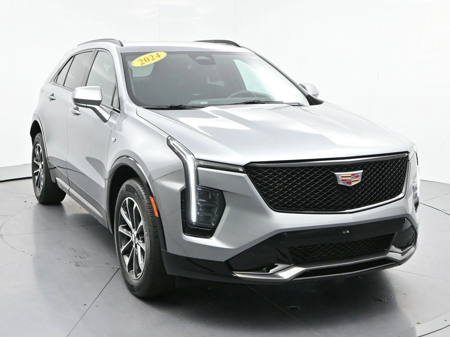 Used 2024 Argent Silver Metallic Cadillac Sport image 2