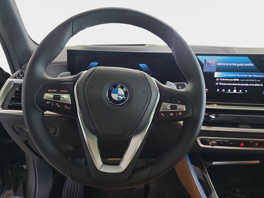 New 2026 Manhattan Green Metallic BMW xDrive50e image 13