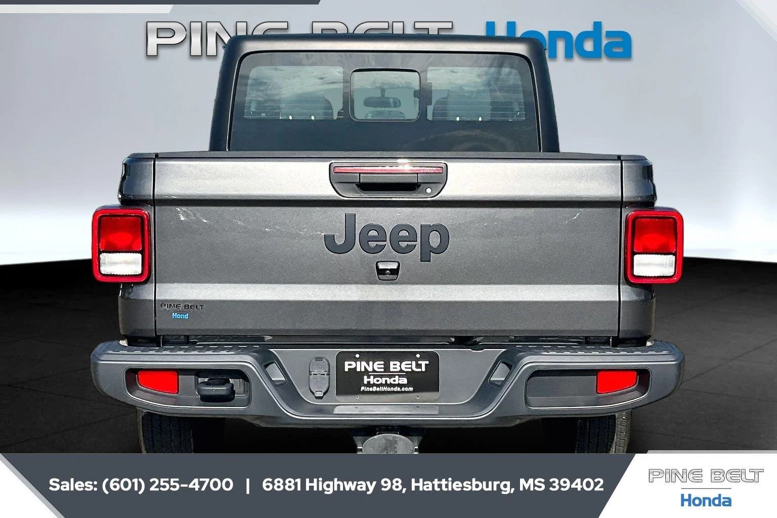 Used 2023 Granite Crystal Metallic Clearcoat Jeep Sport image 4