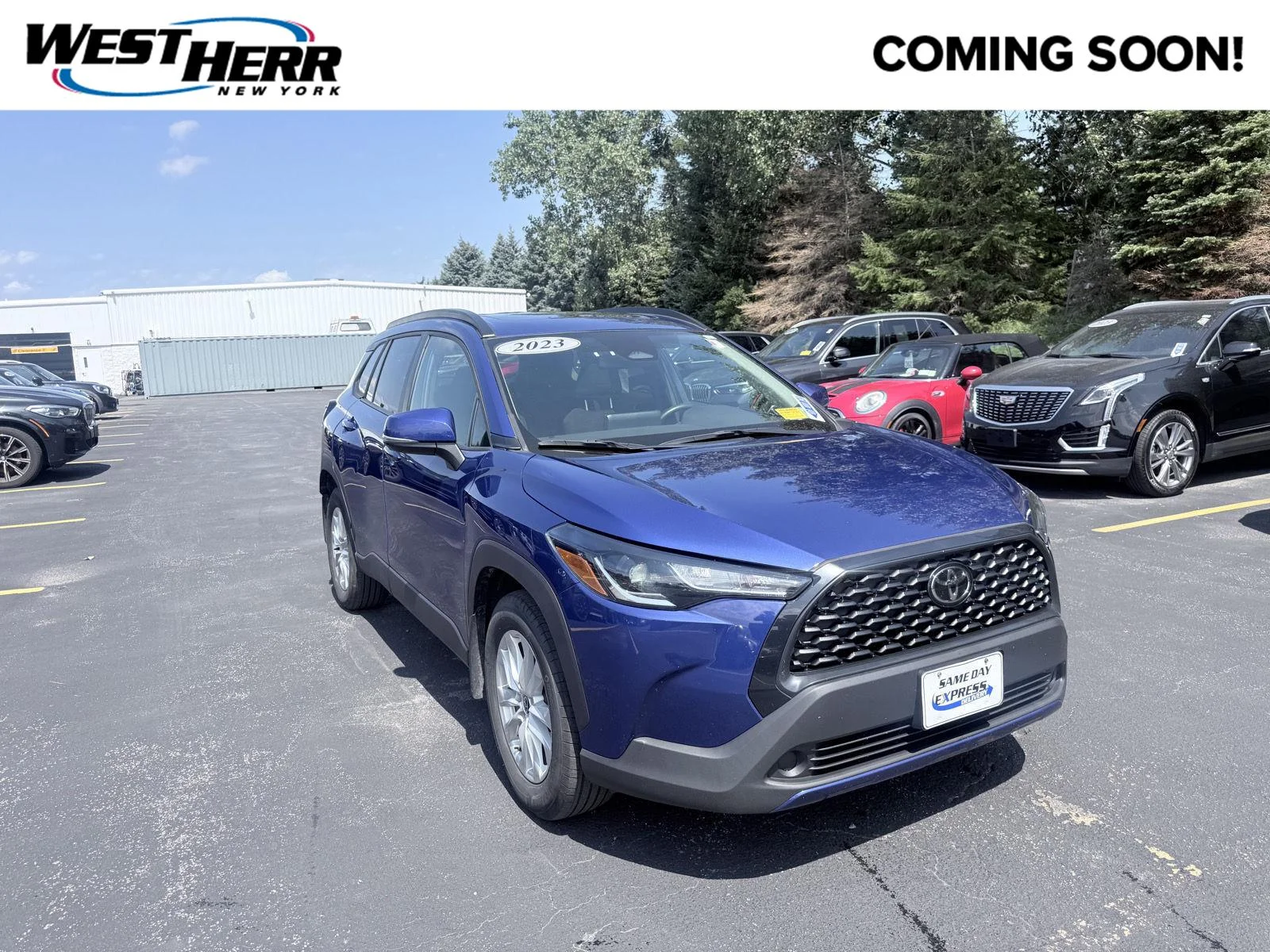 Used 2023 Blue Crush Metallic Toyota LE image 1