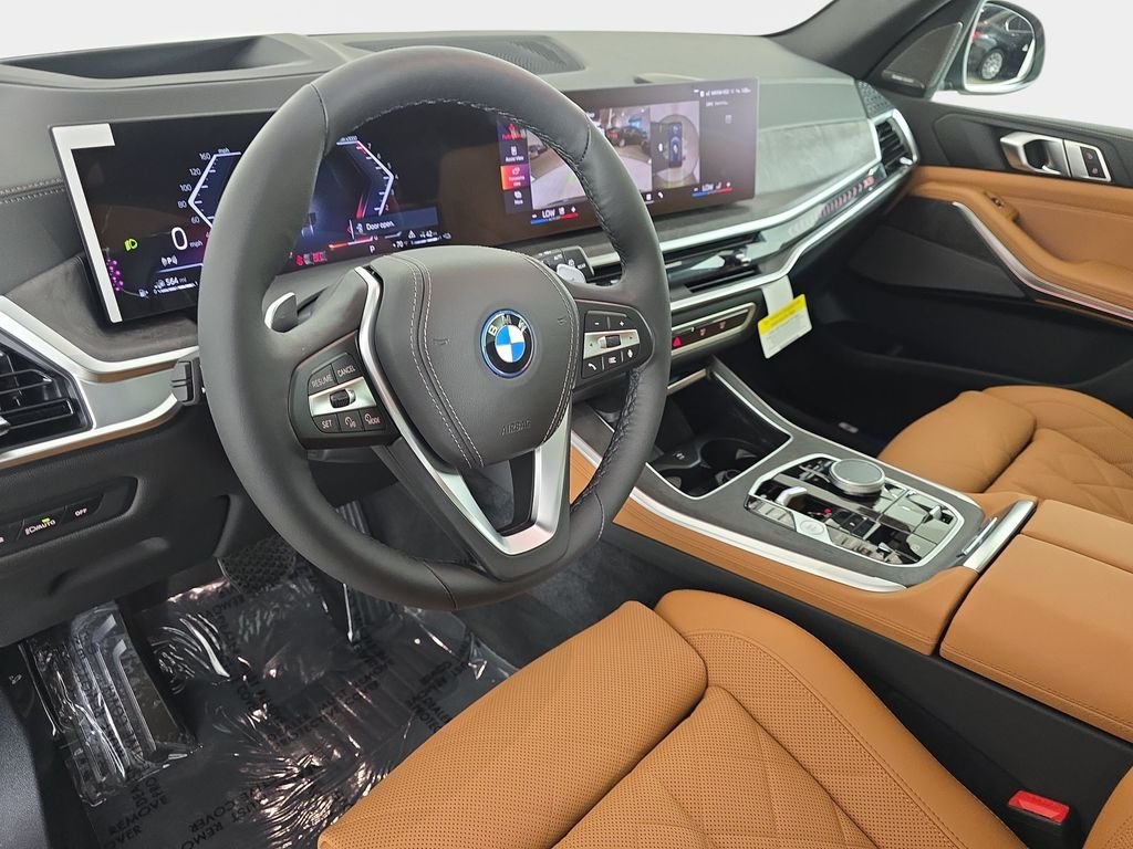 New 2026 Tanzanite Blue II Metallic BMW xDrive50e image 16