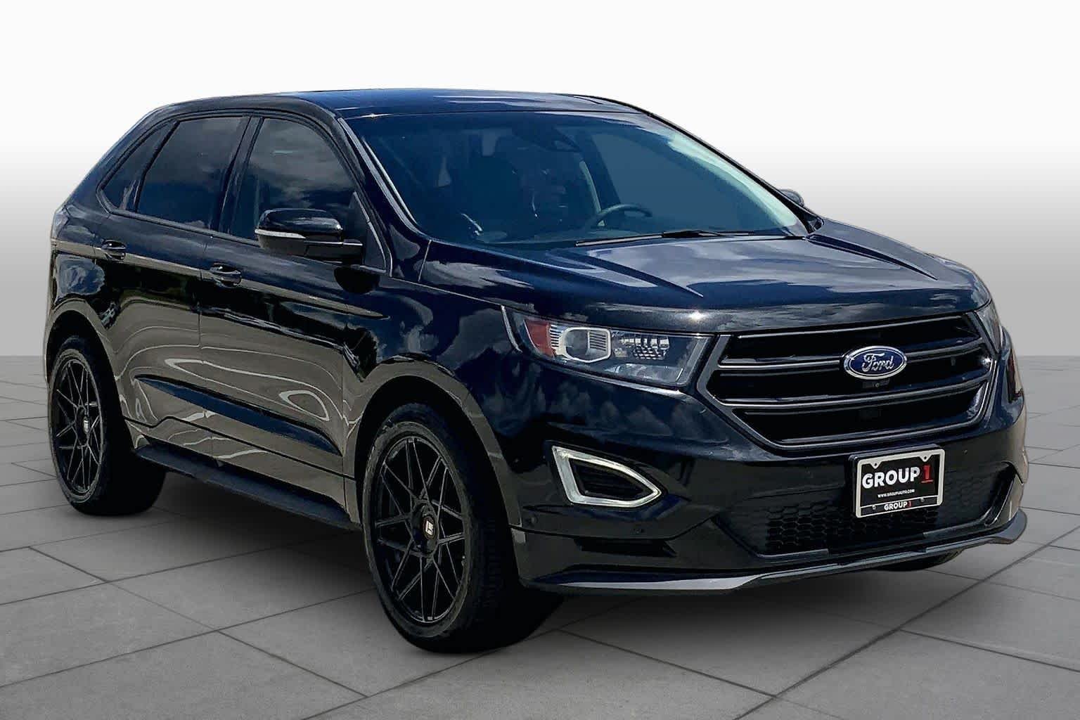 Used 2015 Tuxedo Black Ford Sport image 3