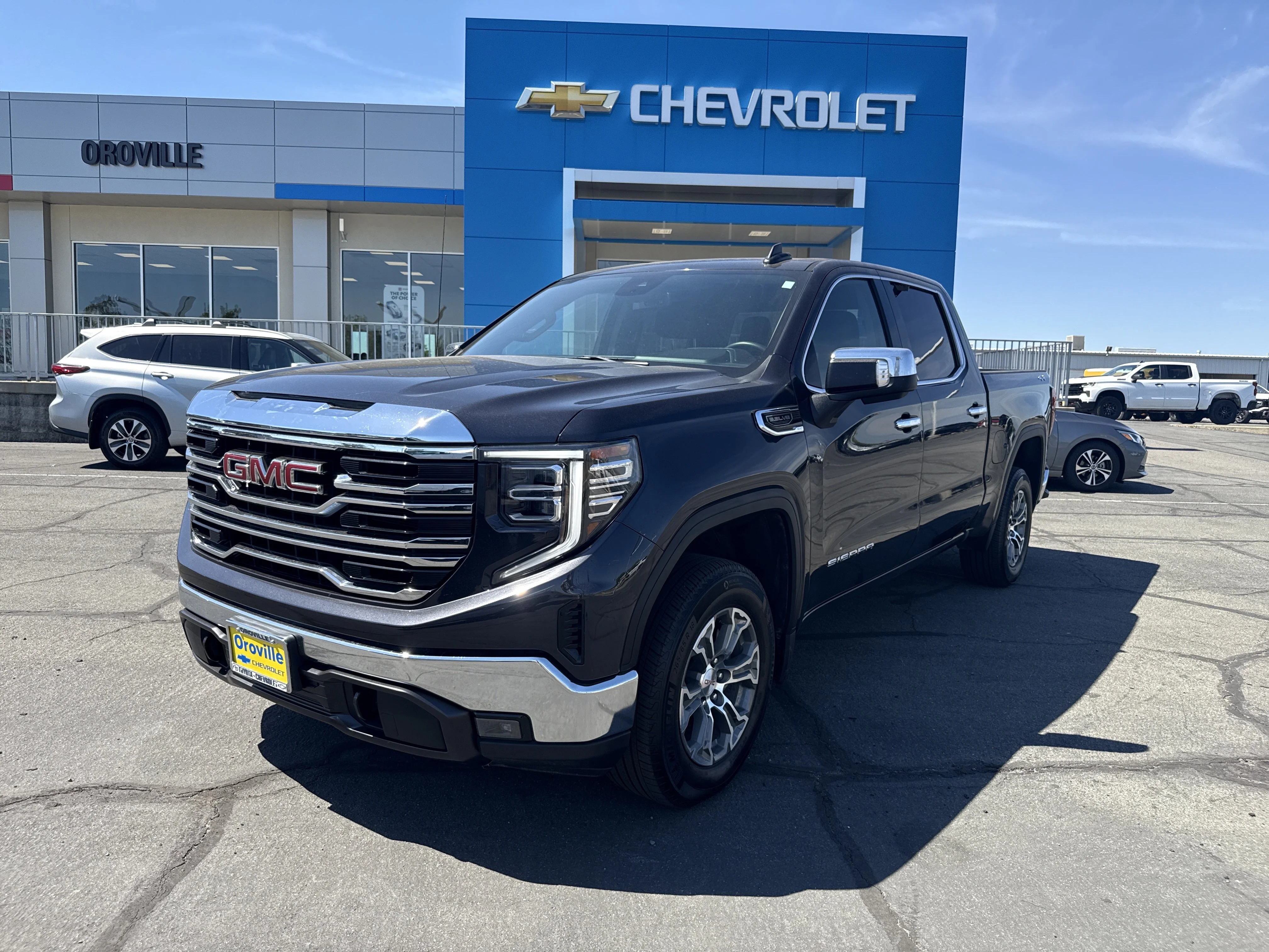 Used 2025 Titanium Rush Metallic GMC SLT image 1