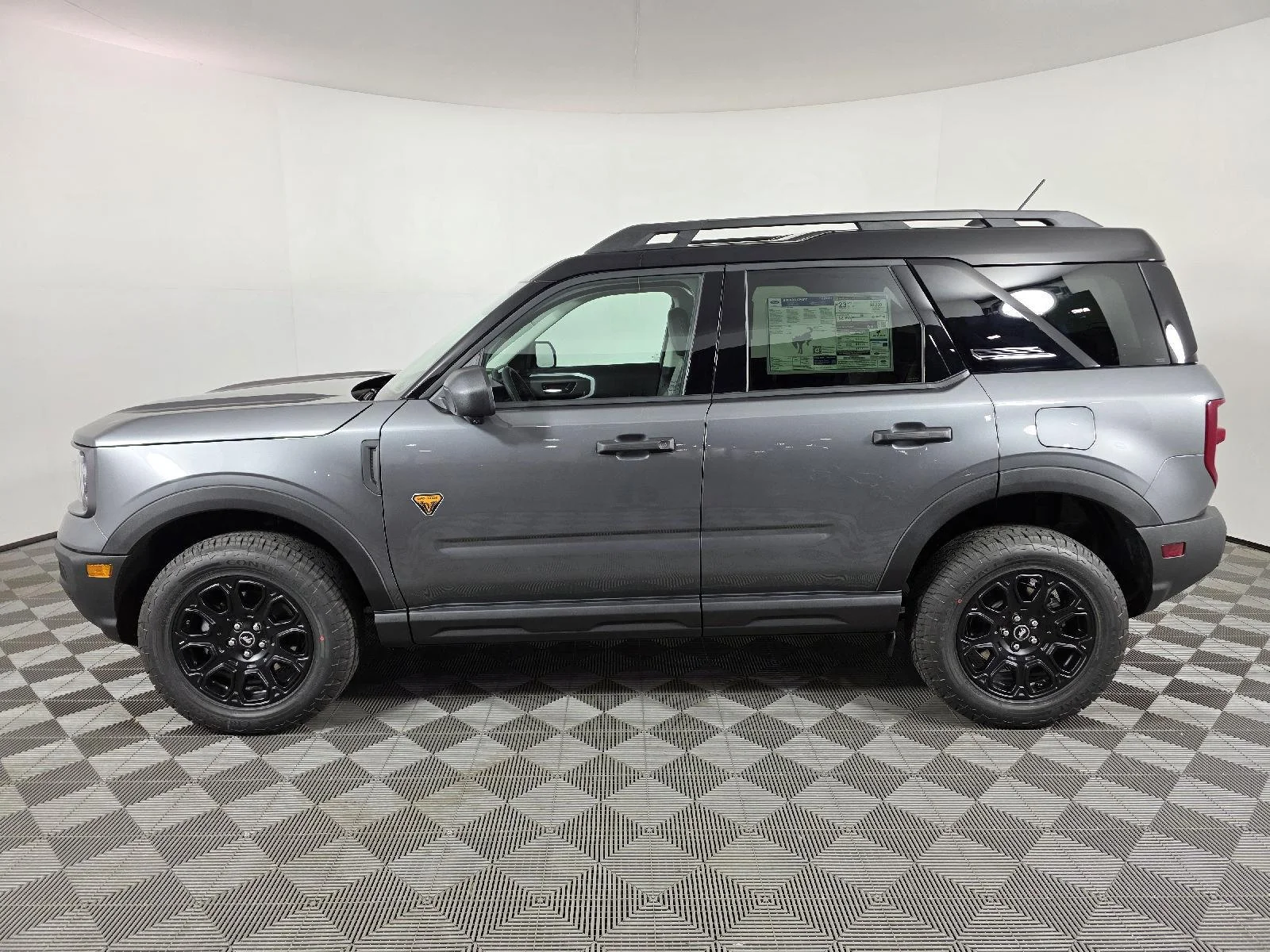 Used 2026 Carbonized Gray Metallic Ford Badlands image 2