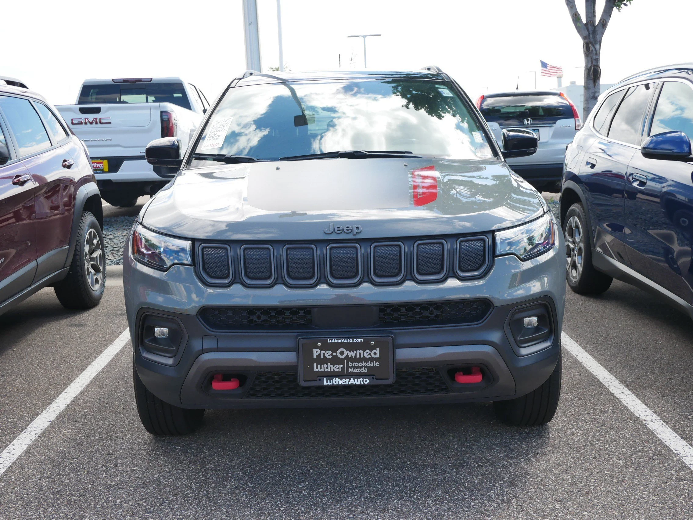 Used 2022 Jeep Compass Trailhawk with VIN 3C4NJDDBXNT168048 for sale in Brooklyn Center, Minnesota