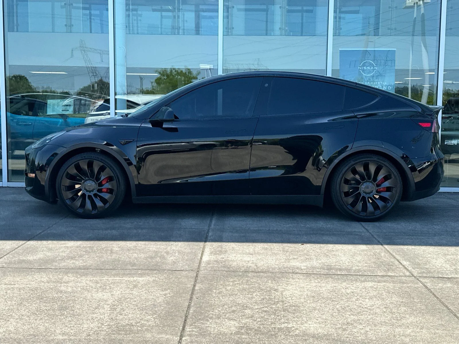 Used 2022 Solid Black Tesla Performance image 6