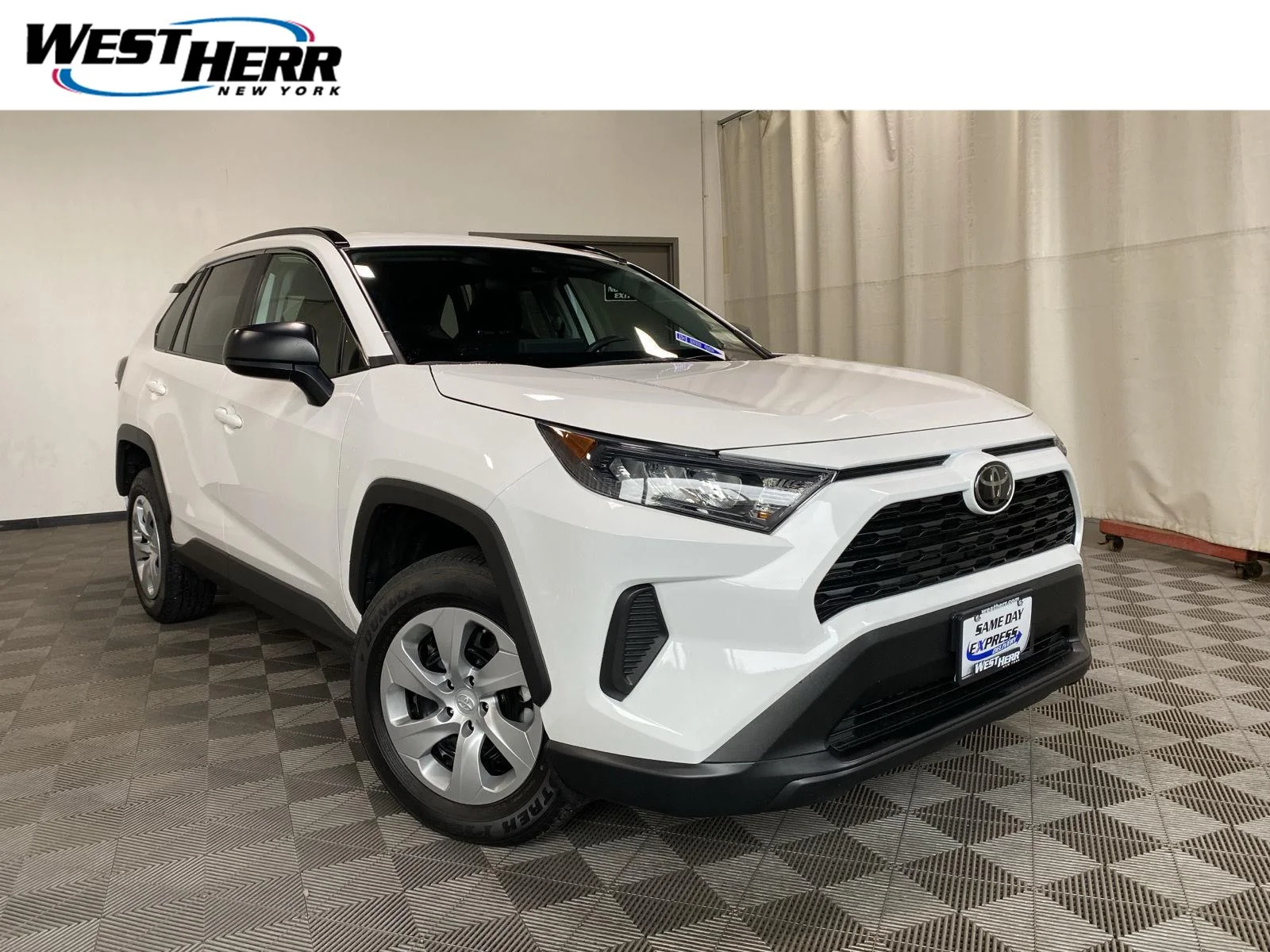 Used 2021 Super White Toyota LE image 1