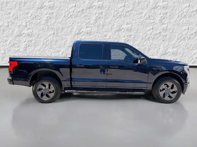 Used 2022 Ford F-150 Lightning Lariat with VIN 1FTVW1EV5NWG03092 for sale in Sarasota, FL
