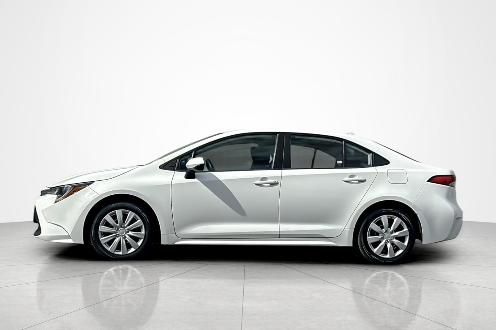 Certified Used 2021 Super White Toyota LE image 2