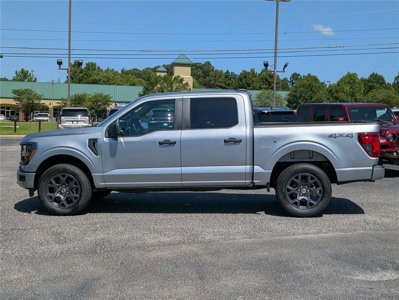 New 2026 Iconic Silver Metallic FORD STX 4WD SUPERCREW 5.5