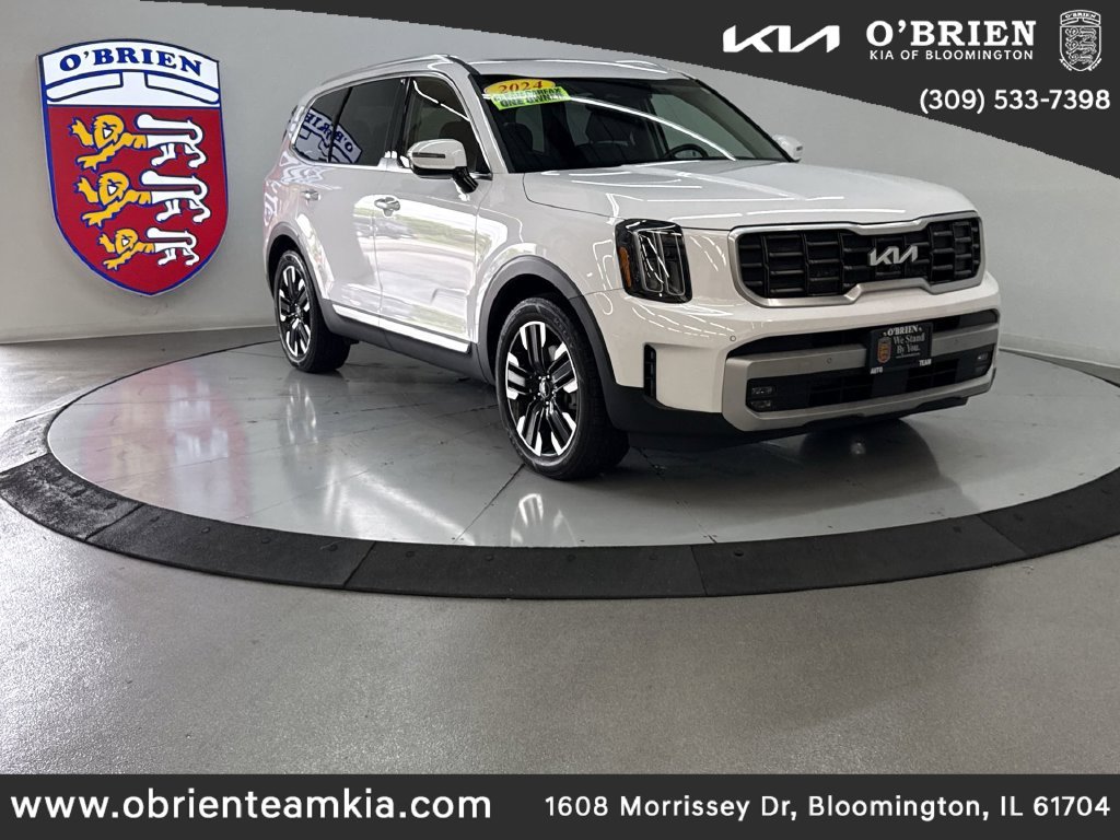Used 2024 White Pearl Kia SX image 1