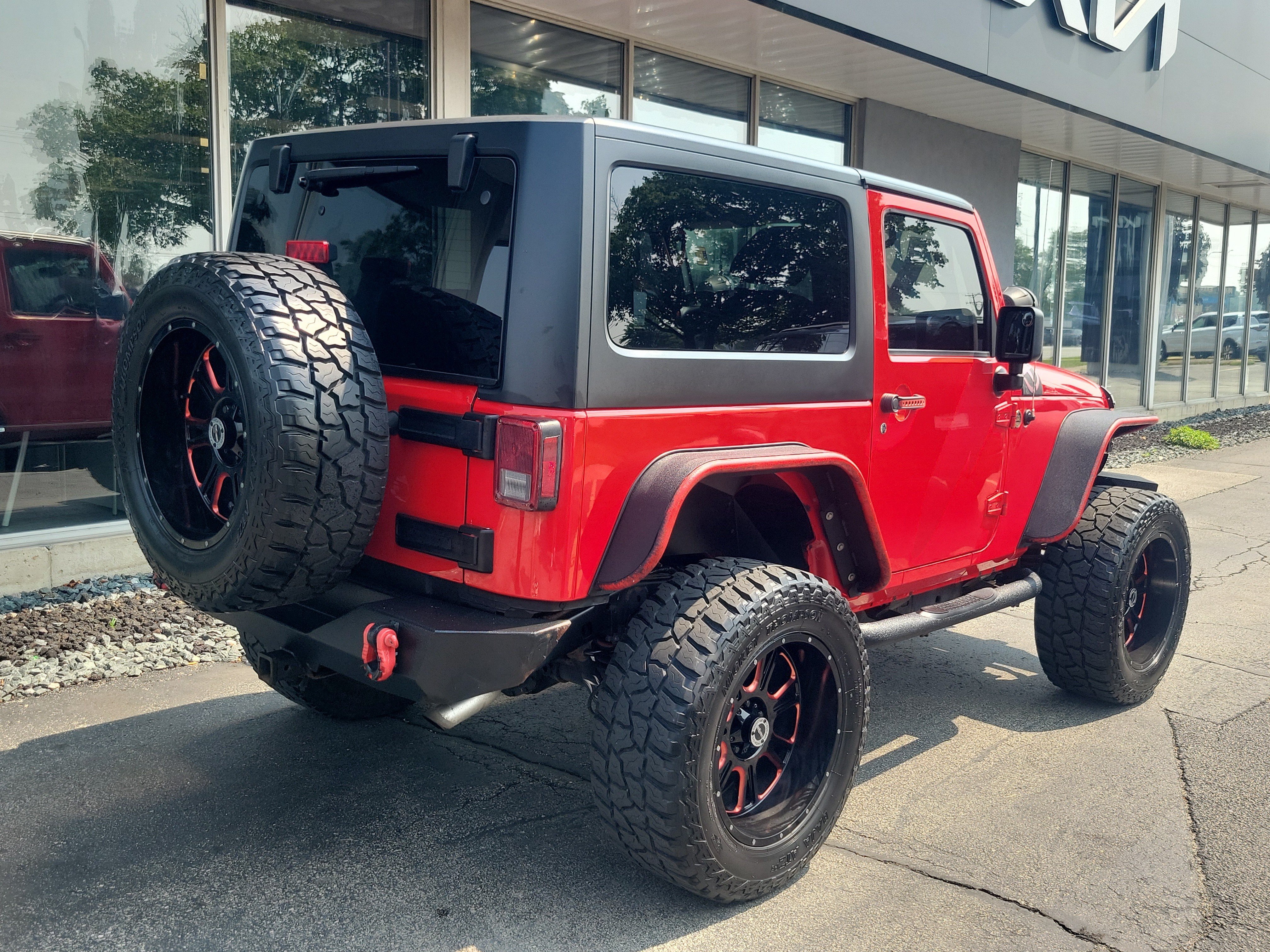 Used 2017 Firecracker Red Clearcoat Jeep Sport image 4