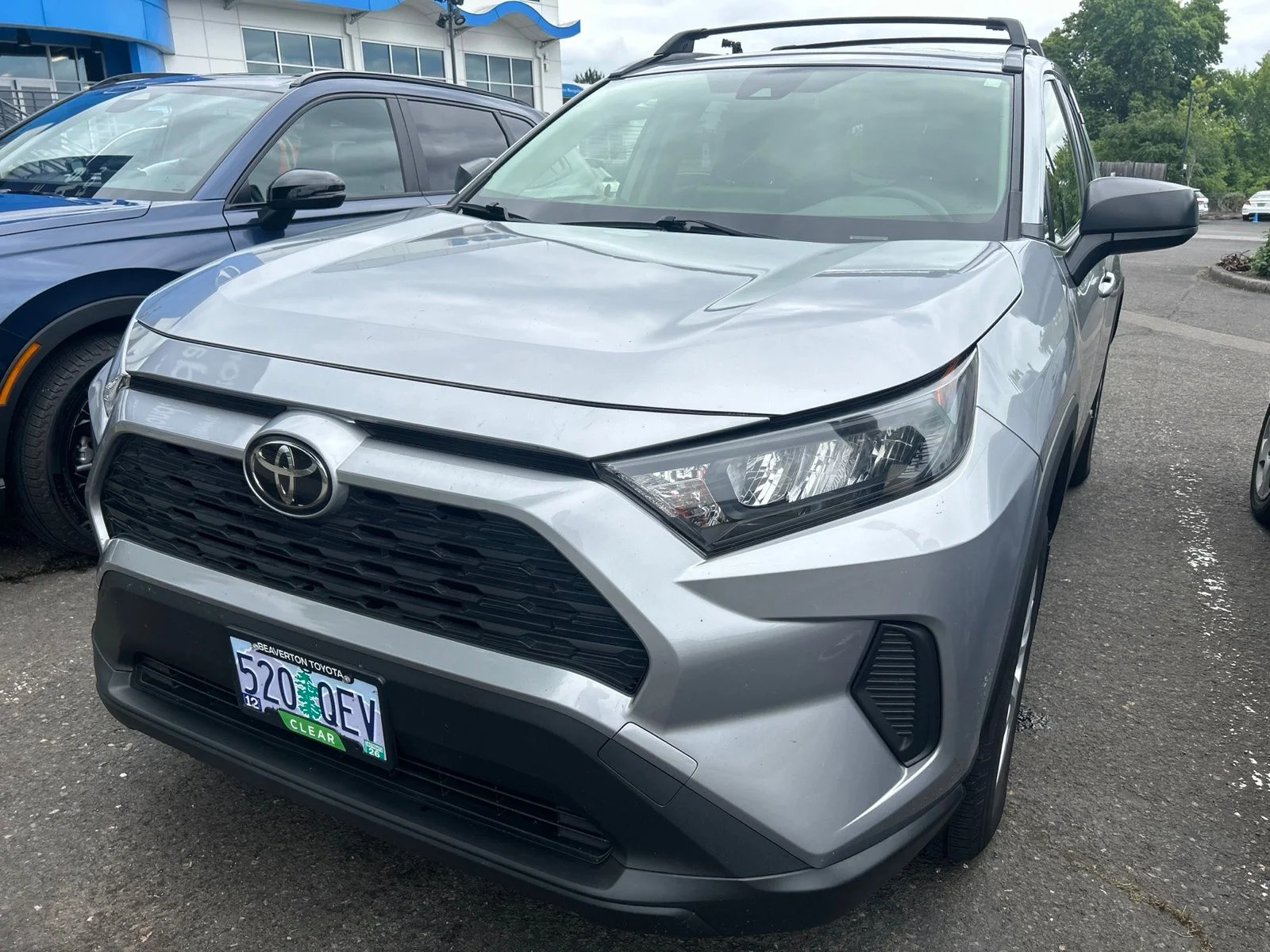 Used 2019 Silver Sky Metallic Toyota LE image 1