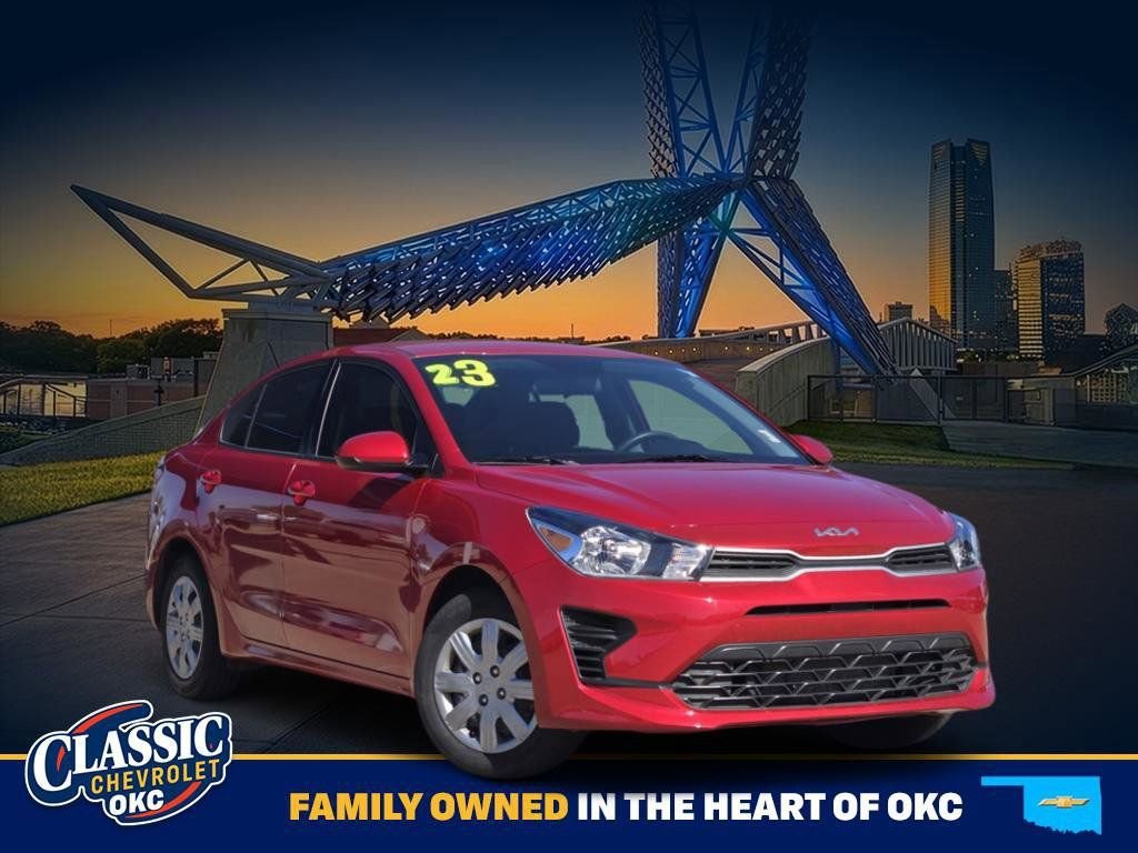 Red 2023 Kia Rio S FWD Sedan Front-Wheel Drive