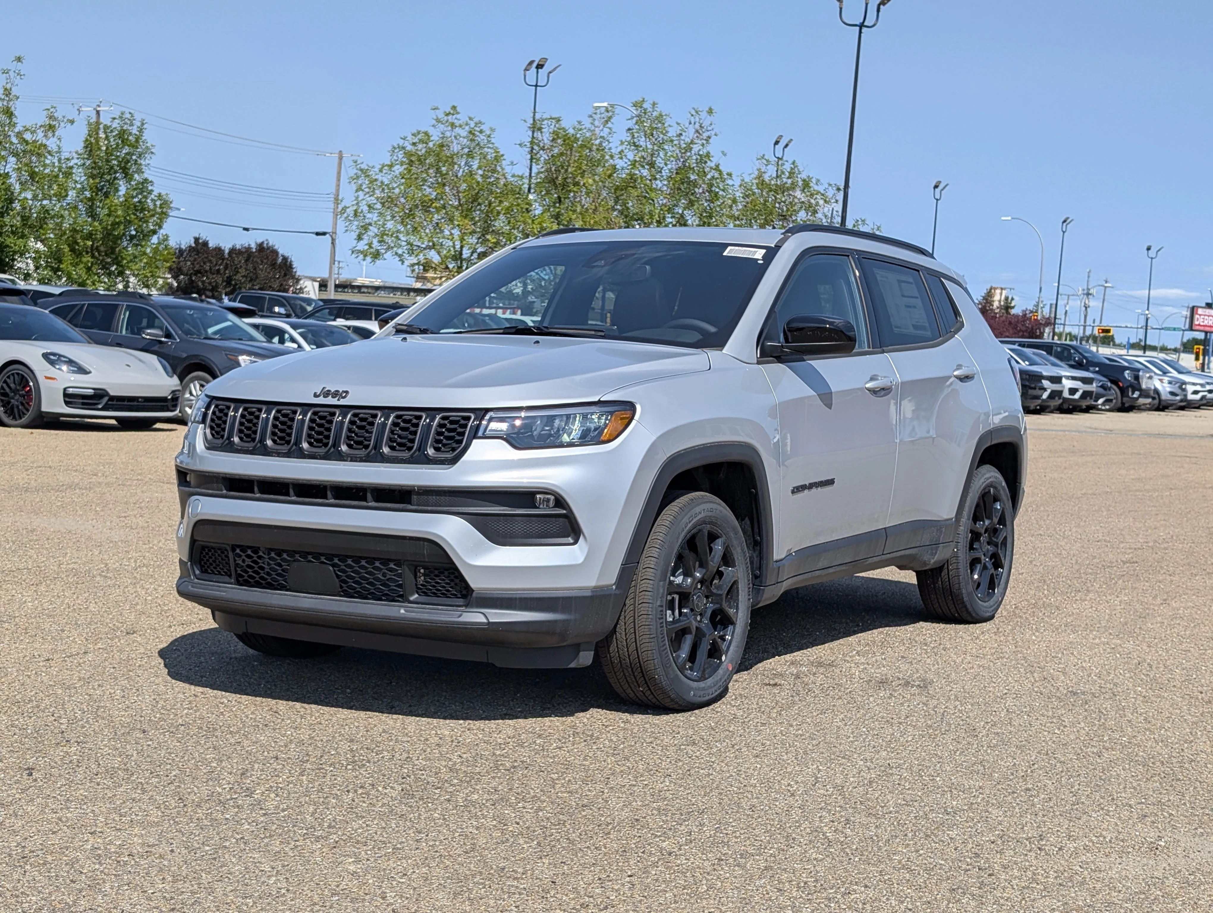 New 2026 Silver Zynith Metallic Jeep North image 2
