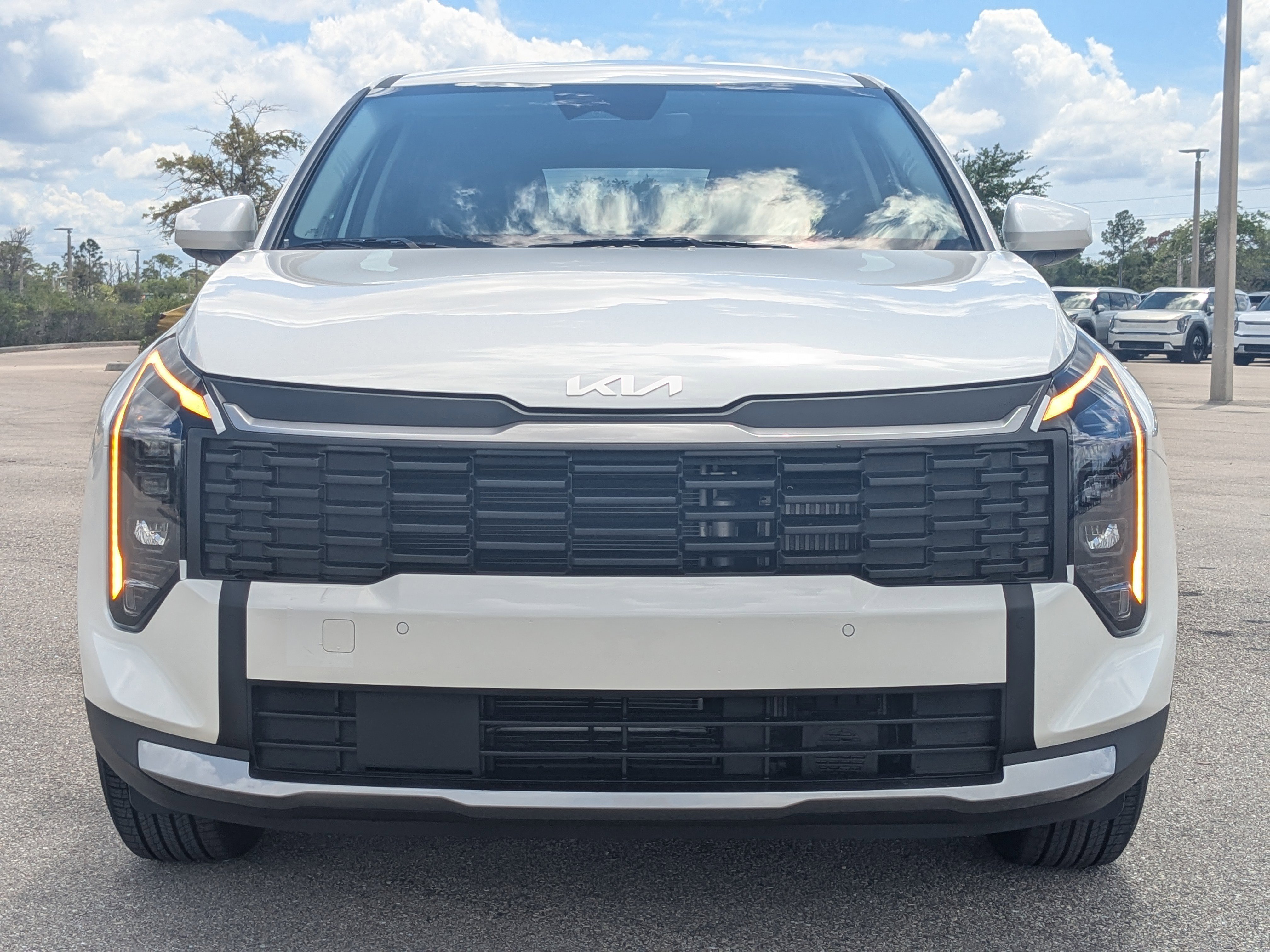New 2026 Snow White Pearl Kia LX image 3