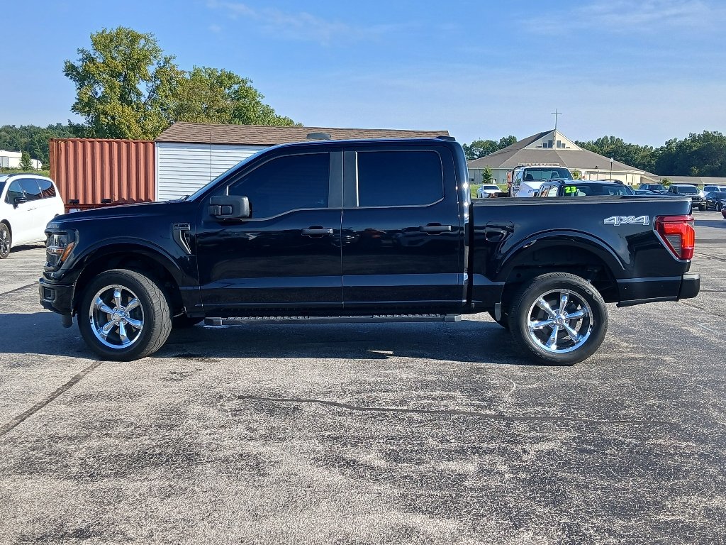 Used 2024 Agate Black Metallic Ford STX image 2