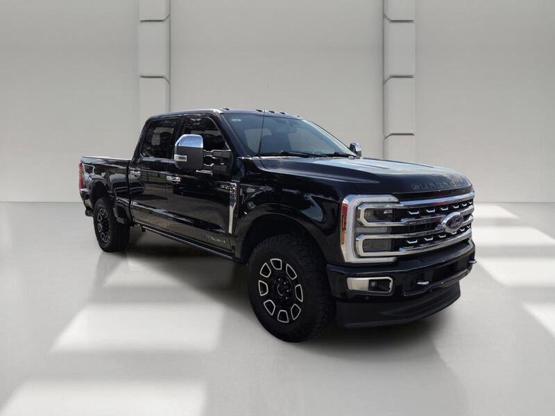 Used 2024 Black Metallic FORD PLATINUM 4WD CREW CAB 6.75