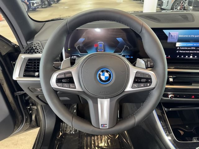 New 2026 Manhattan Green Metallic BMW xDrive50e image 16