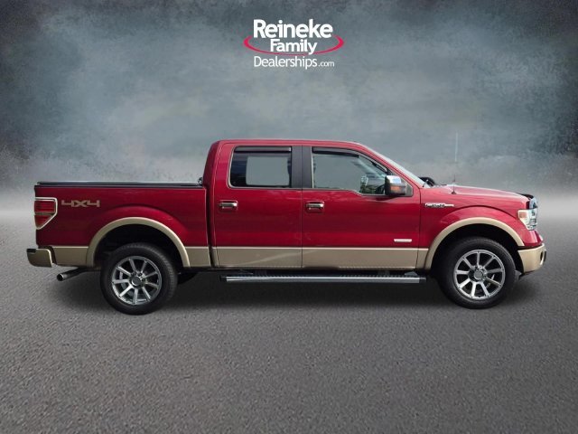 Used 2013 Ruby Red Ford Lariat image 4