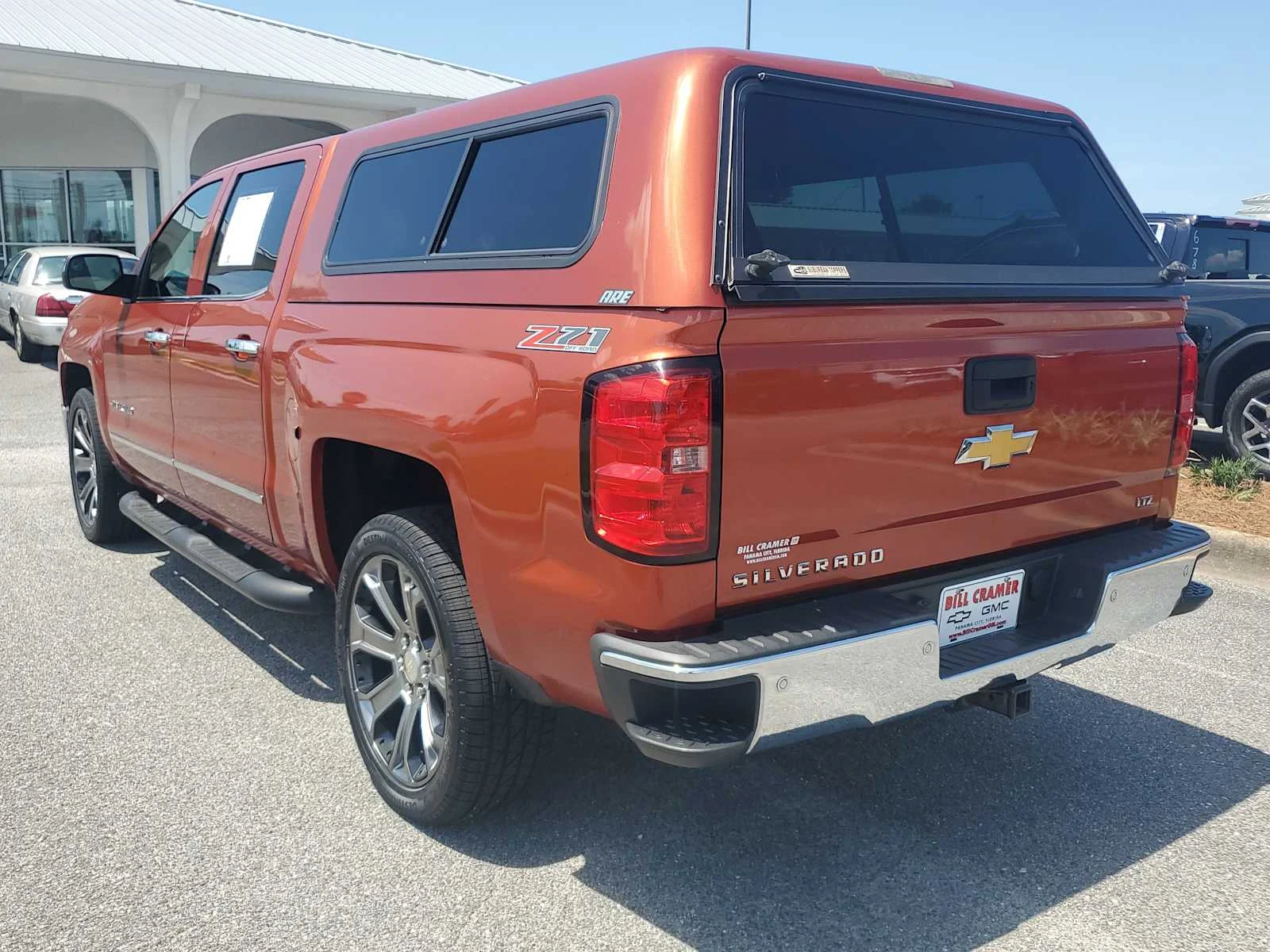 Used 2015 SUNSET ORANGE METALLIC Chevrolet LTZ image 3