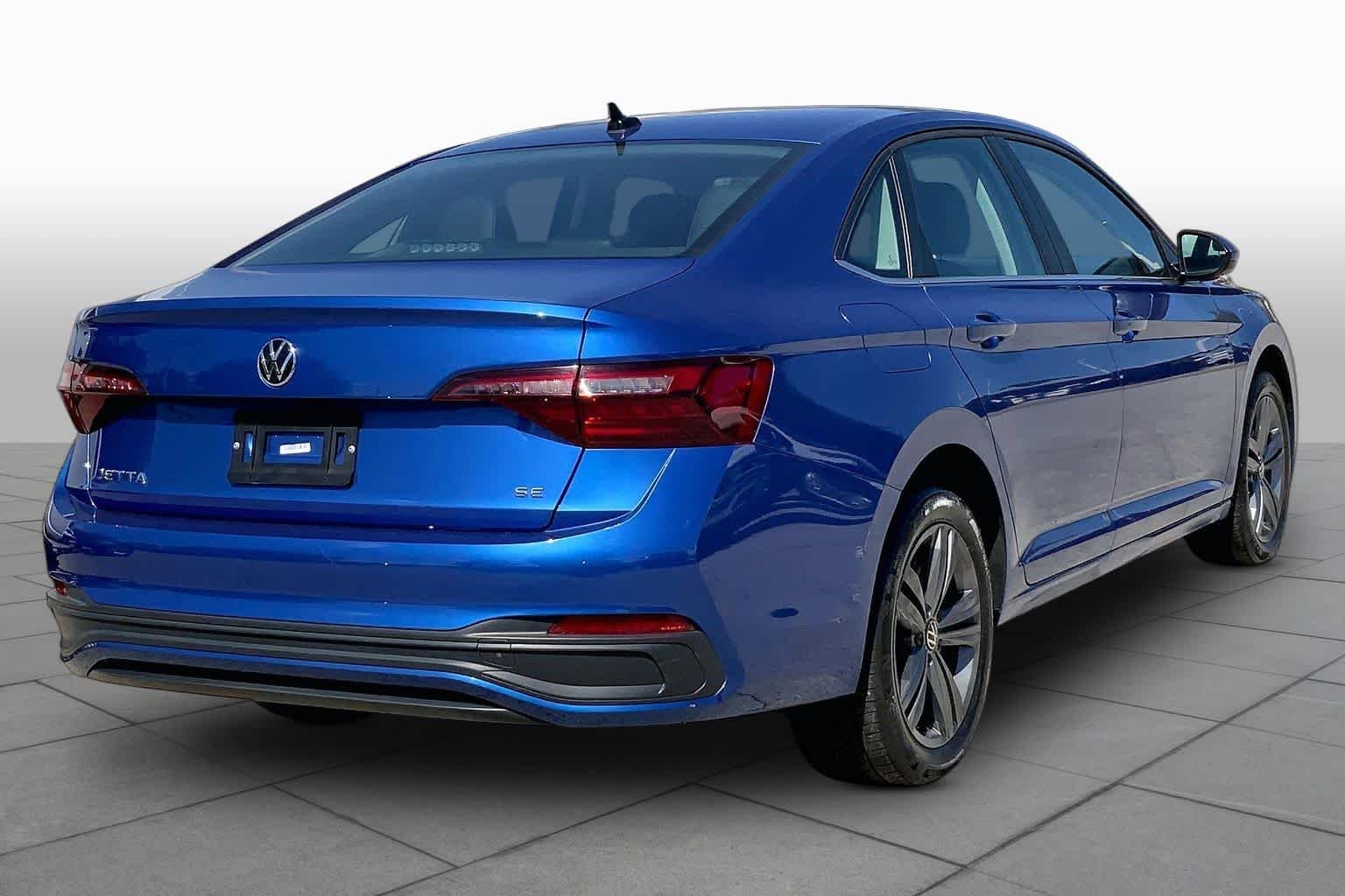 Used 2024 Rising Blue Metallic Volkswagen SE image 13