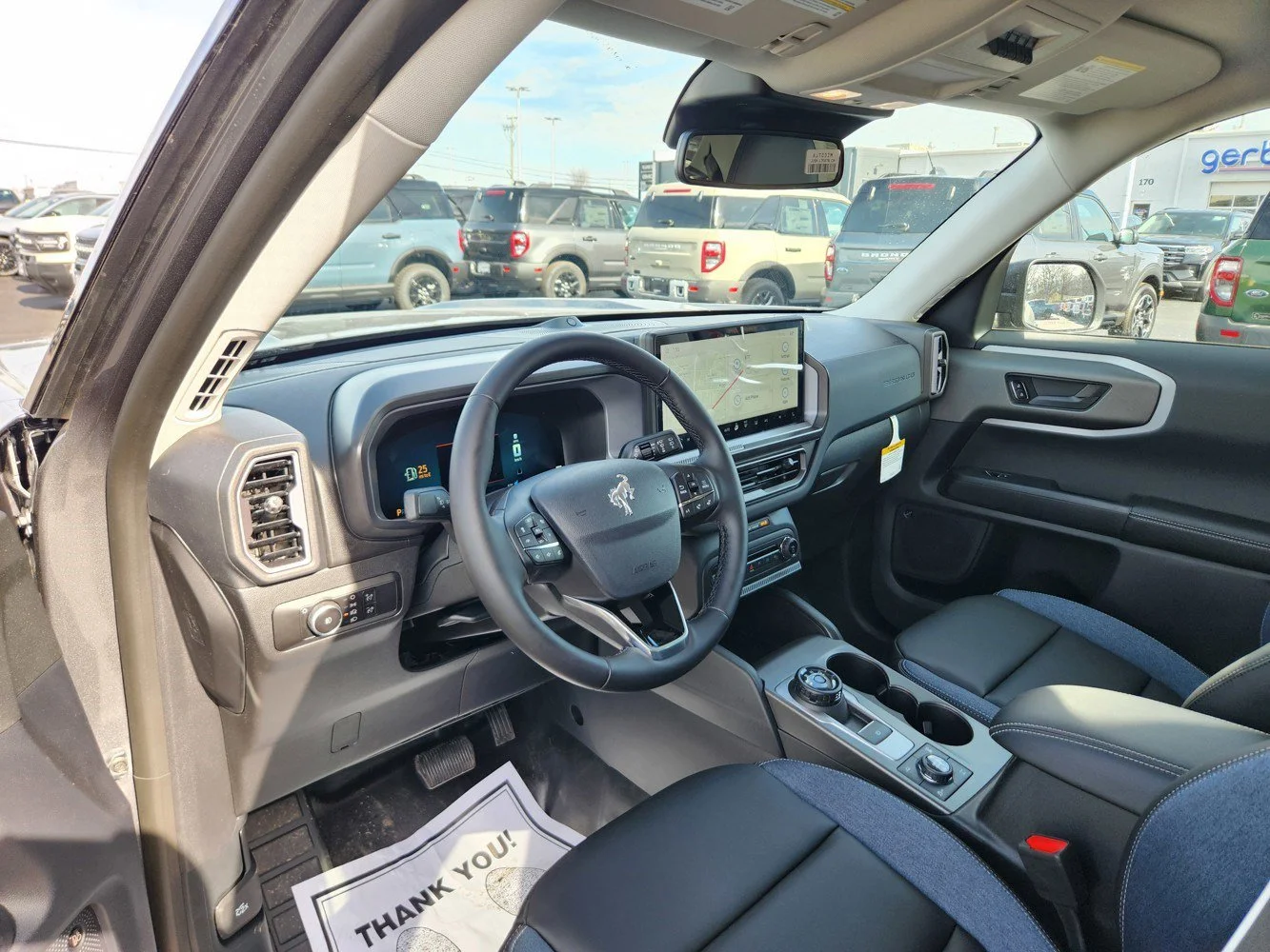 New 2026 Carbonized Gray Metallic Ford Outer Banks image 2