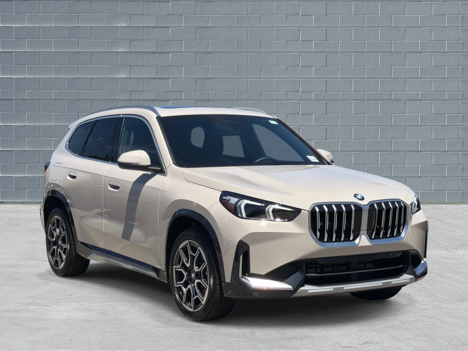 New 2026 Dune Grey Metallic BMW xDrive28i image 1