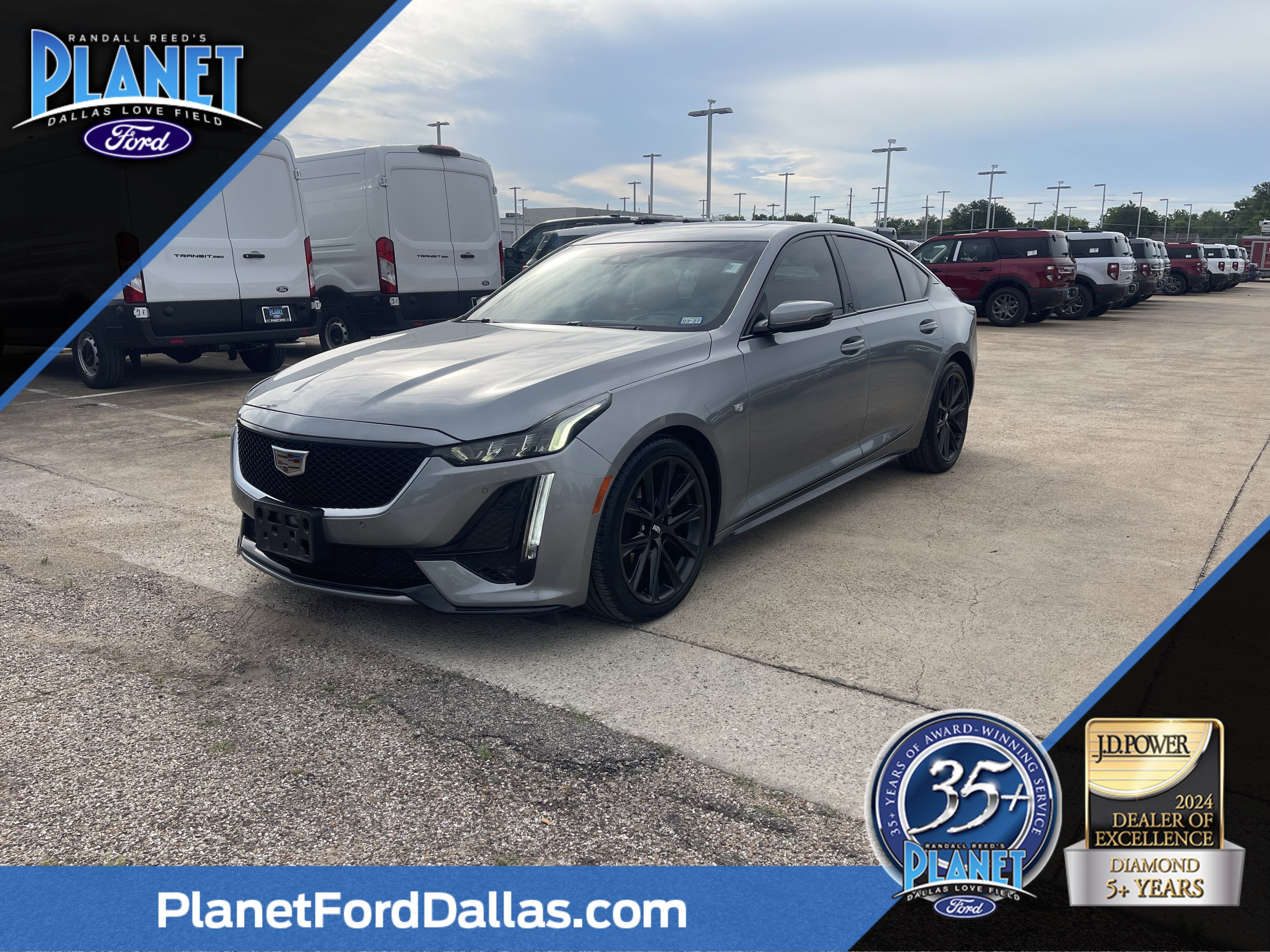 Used 2023 Silver Metallic Cadillac Sport image 1
