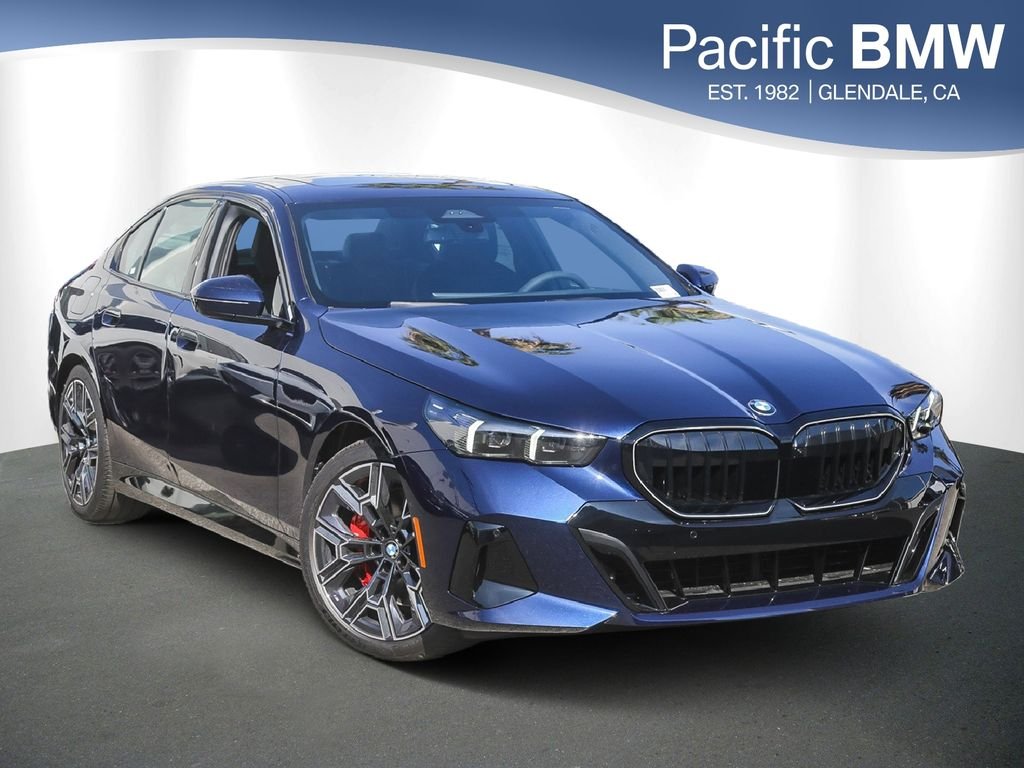 New 2026 Tanzanite Blue II Metallic BMW 540i xDrive image 1