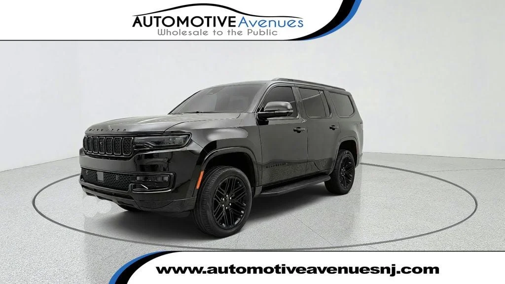 Used 2023 Diamond Black Crystal Pearlcoat Jeep Series II Carbide 4x4 image 1