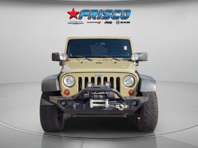 Used 2013 Green Jeep Unlimited Sport image 2