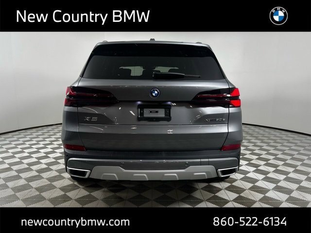Used 2026 Skyscraper Grey Metallic BMW xDrive50e image 5