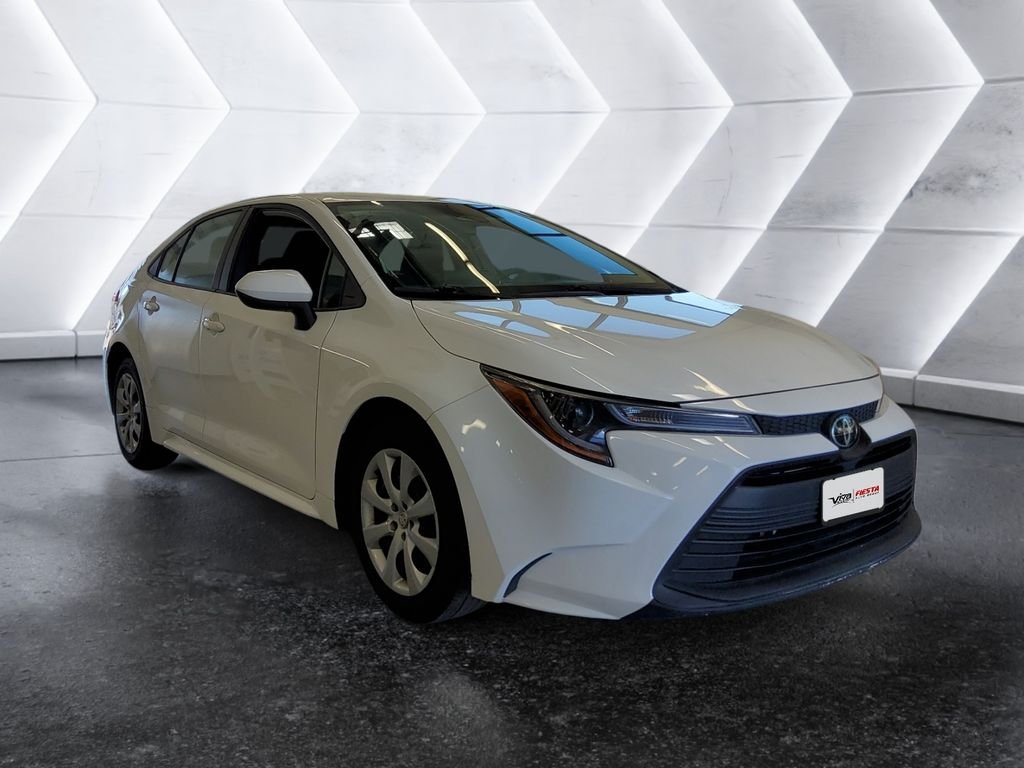 Used 2024 White Toyota LE image 1