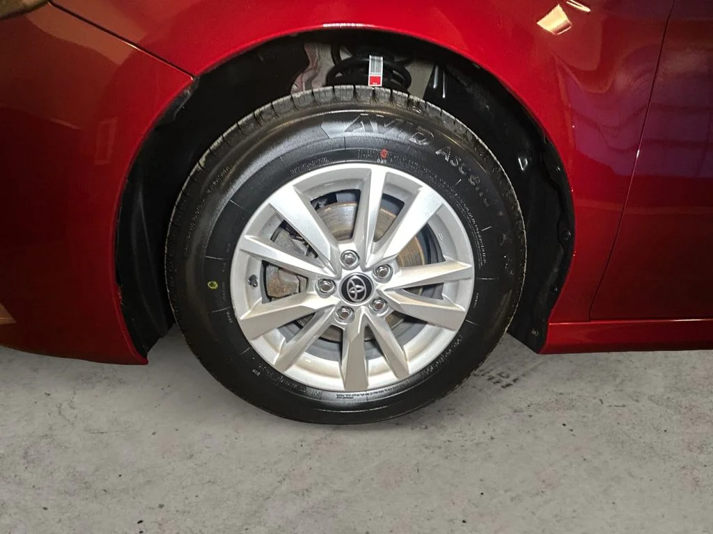 Used 2025 Supersonic Red Toyota LE image 14
