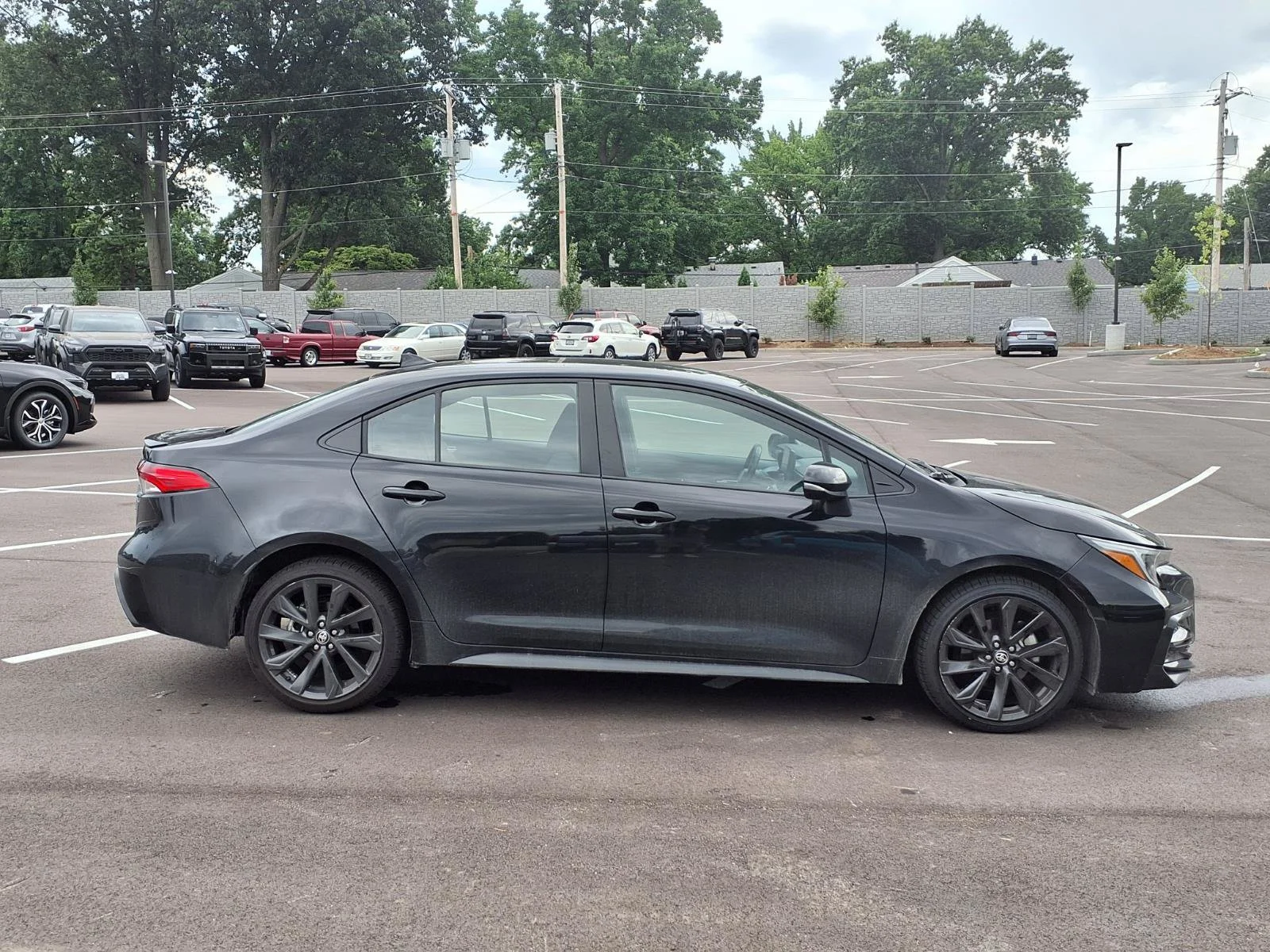 Certified Used 2023 Midnight Black Metallic Toyota SE image 2