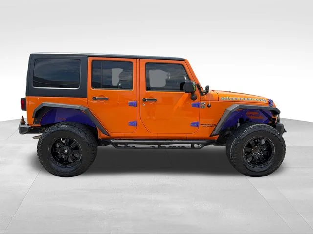 Used 2013 Orange Jeep Unlimited Rubicon image 8