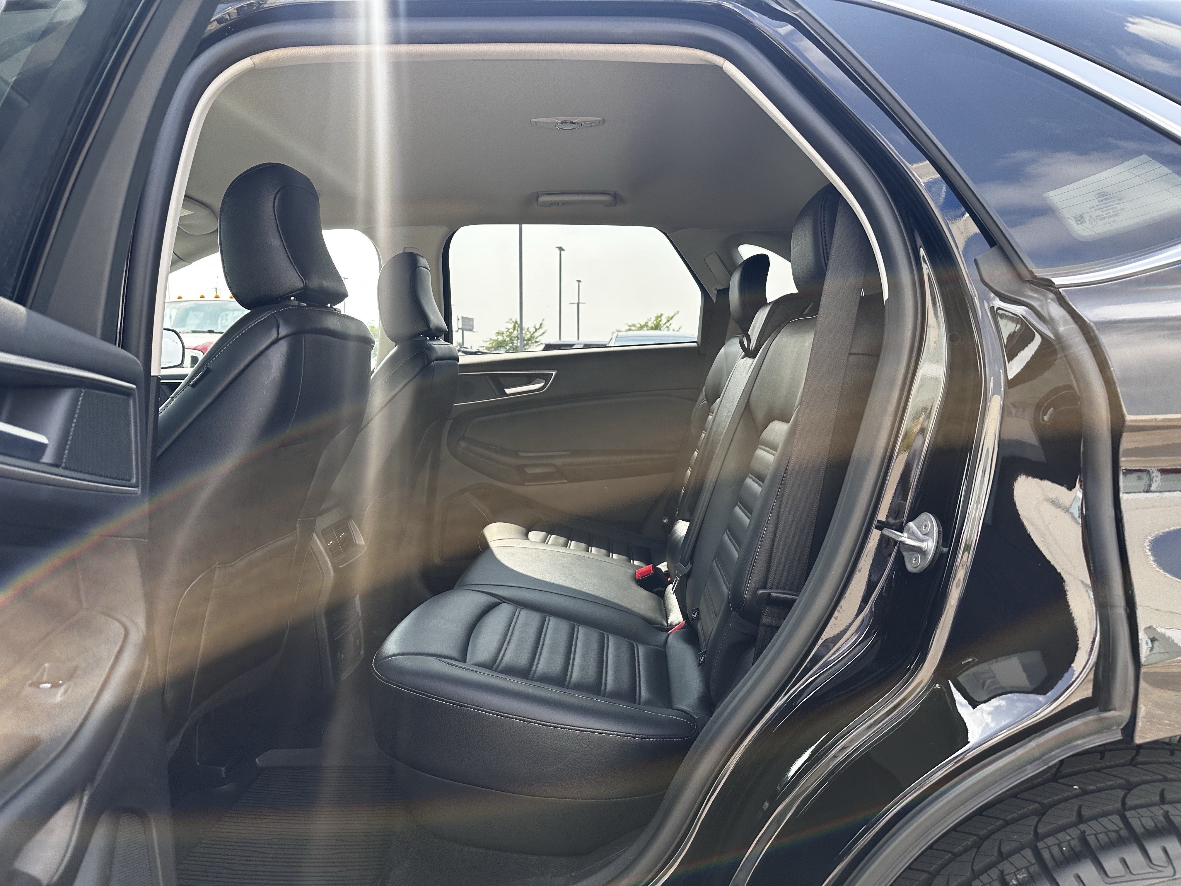 Used 2024 Agate Black Metallic Ford SEL image 19