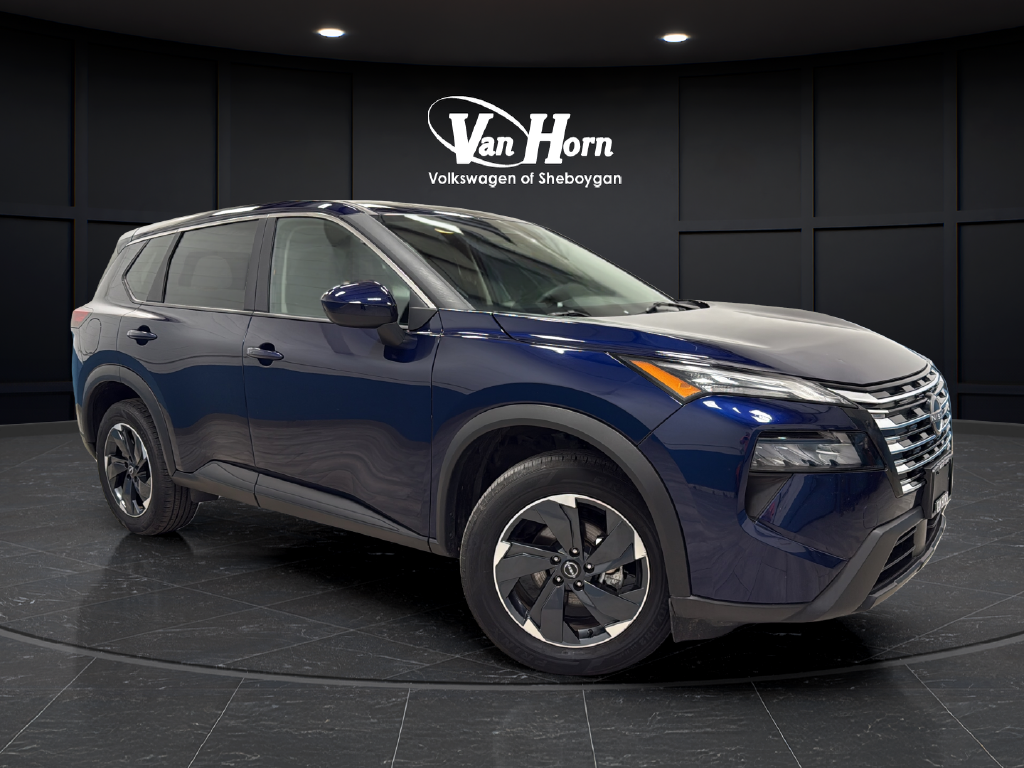 Used 2025 Deep Ocean Blue Pearl Nissan SV image 1
