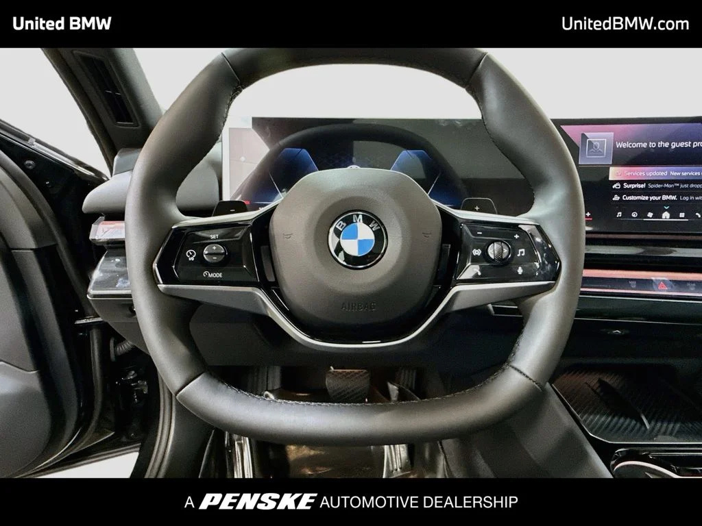 New 2027 Black Sapphire Metallic BMW 530i image 6