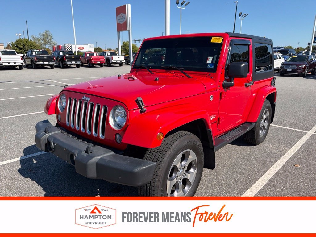 Used 2016 Red Jeep Sahara image 1