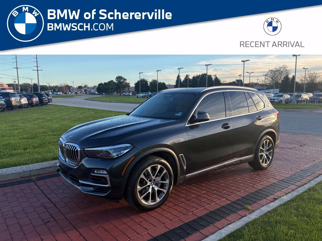 Used 2021 Dark Graphite Metallic BMW sDrive40i image 1