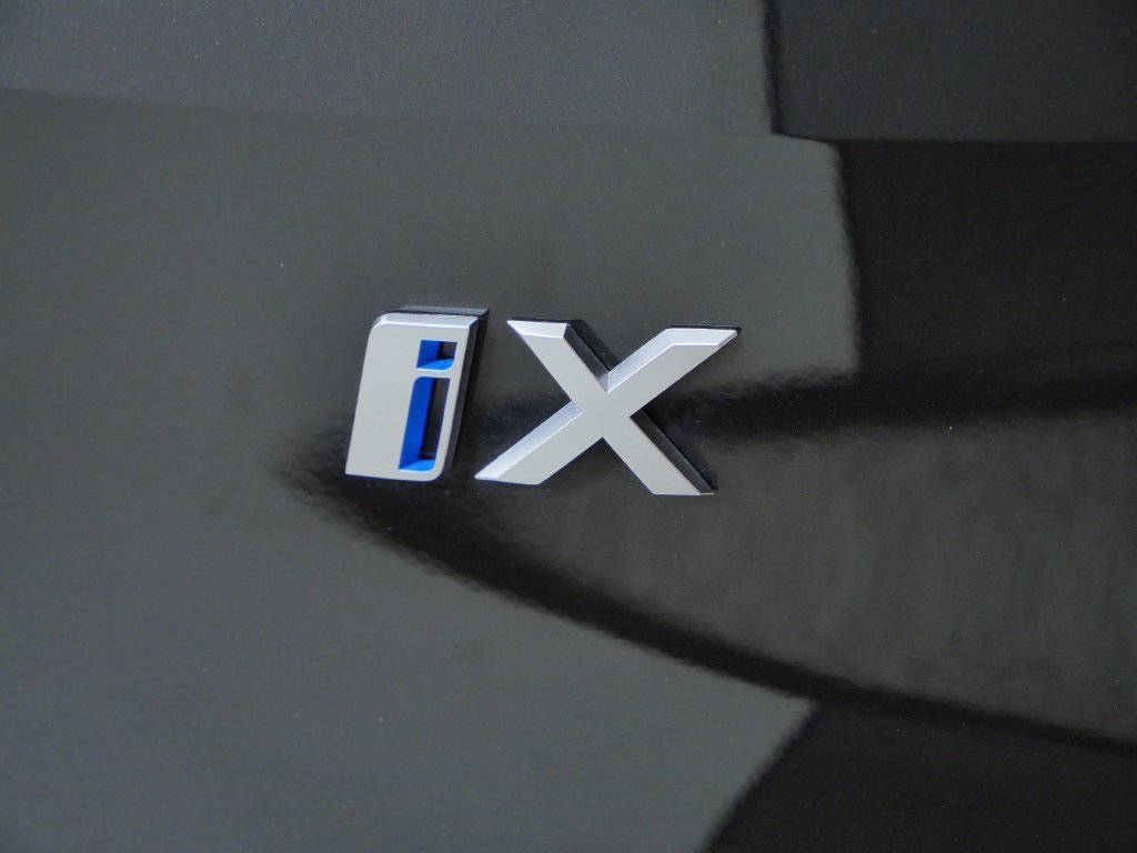 Used 2024 Black BMW xDrive50 image 13