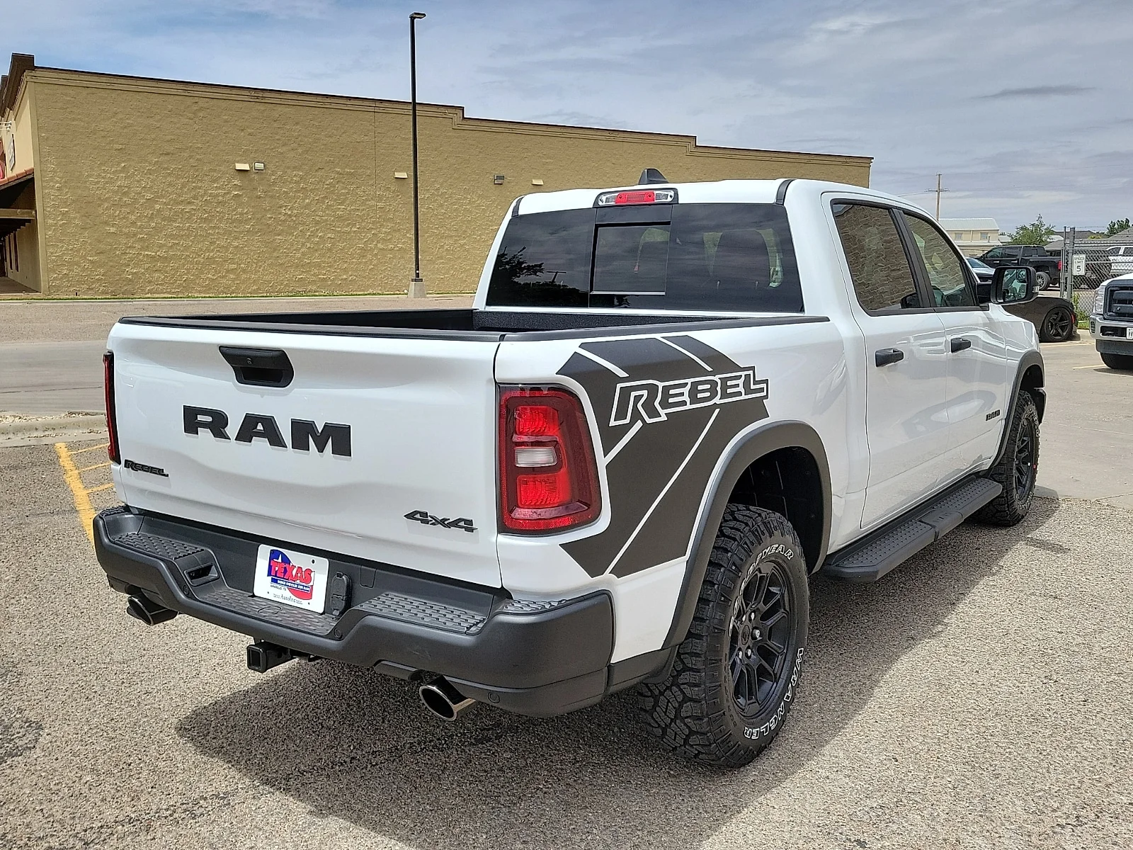 New 2026 PW7 Bright Whit Ram REBEL CREW CAB 4X4 5