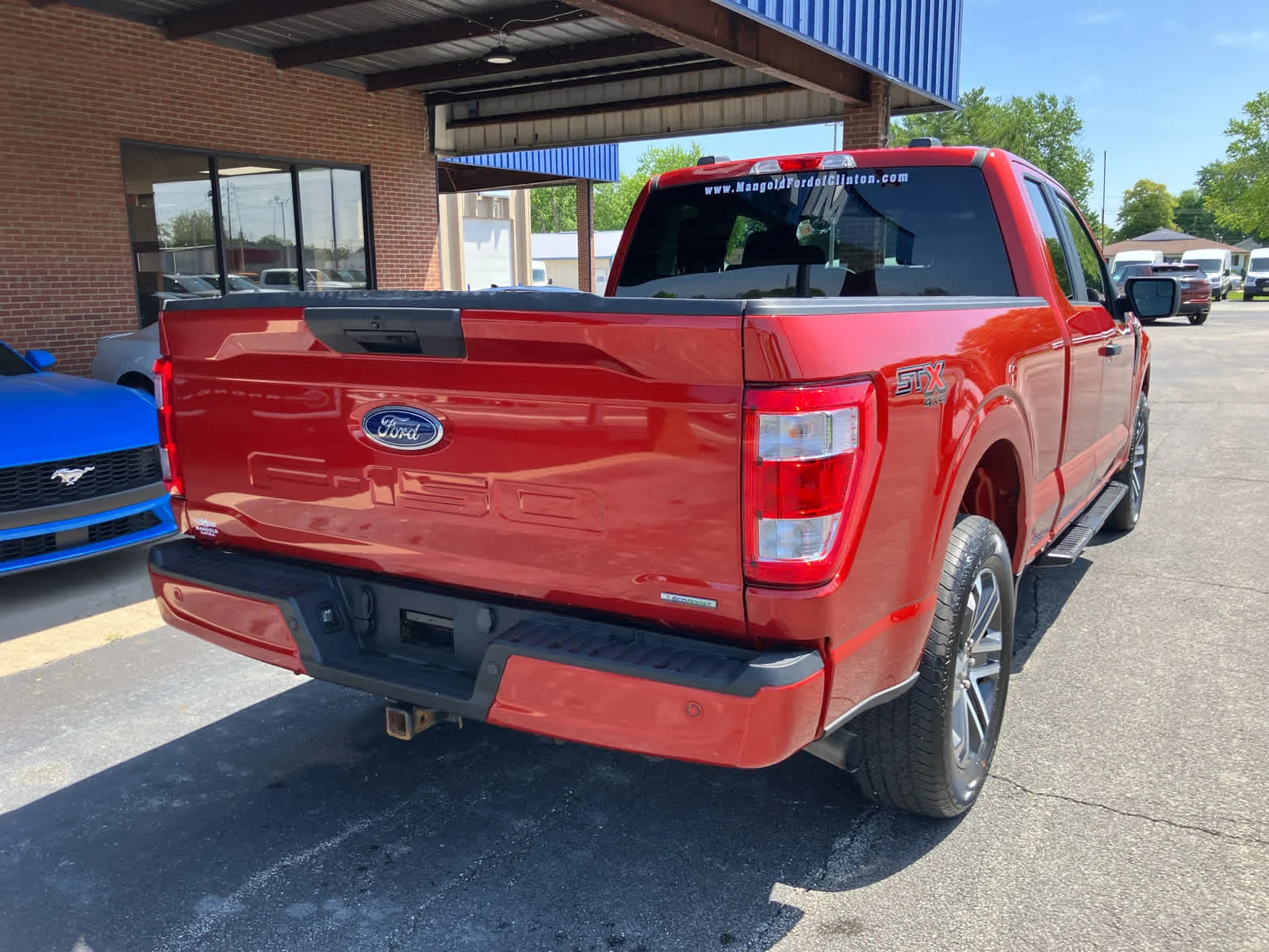Used 2023 Hot Pepper Red Metallic Tinted Clearcoat Ford XL image 27