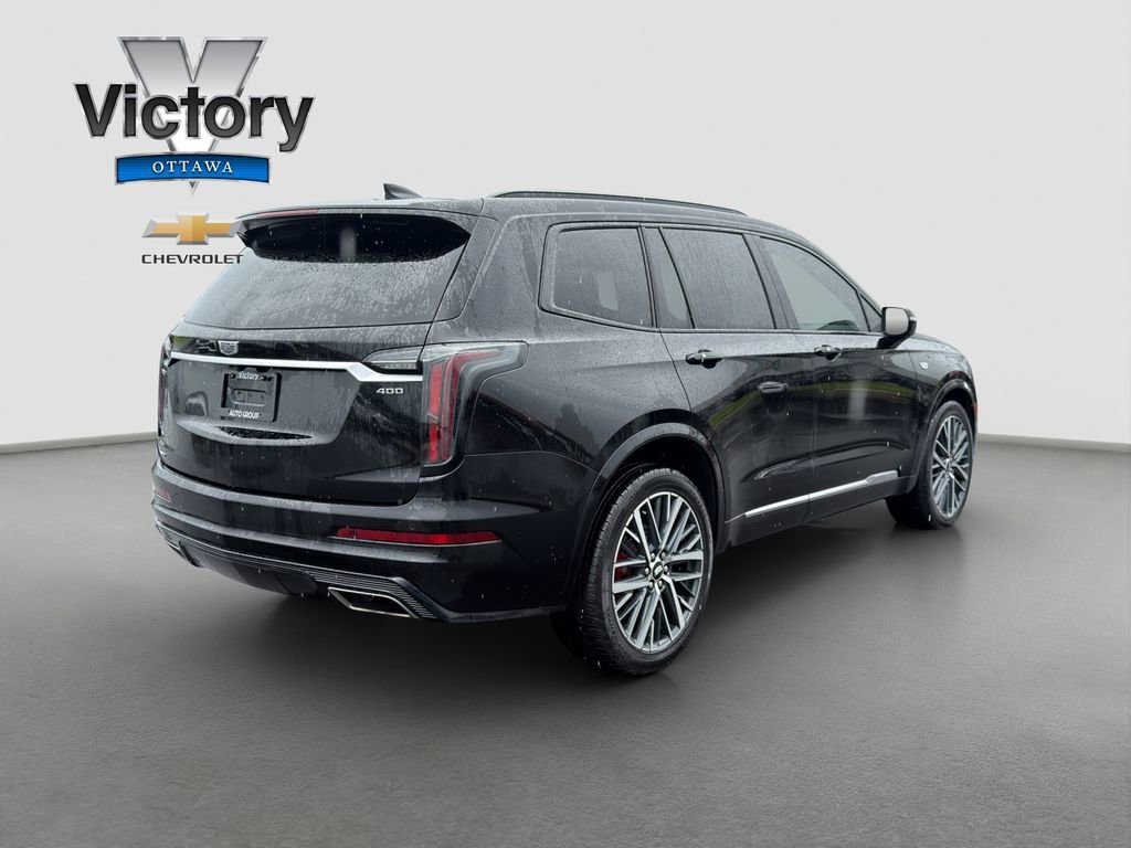 Used 2023 Stellar Black Metallic Cadillac Sport image 6
