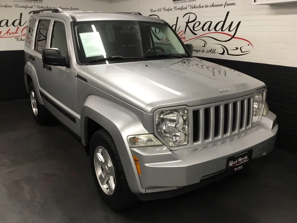 Used 2012 Silver Jeep Sport image 2