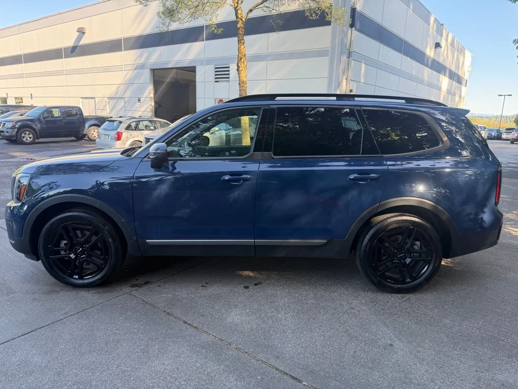 Used 2023 Midnight Lake Blue Kia EX X-Line image 6